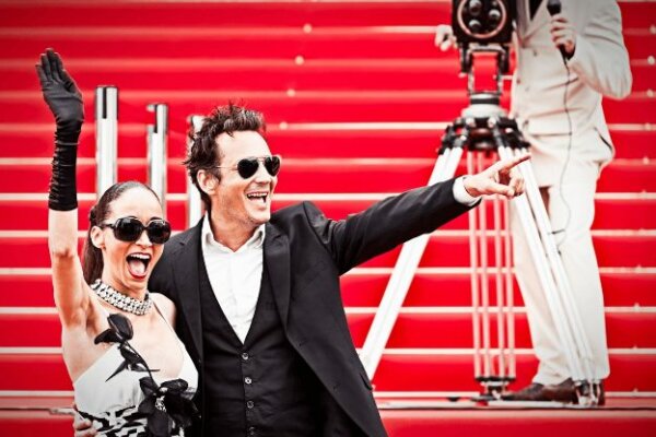 Celebrity couple on red carpet in Cannes